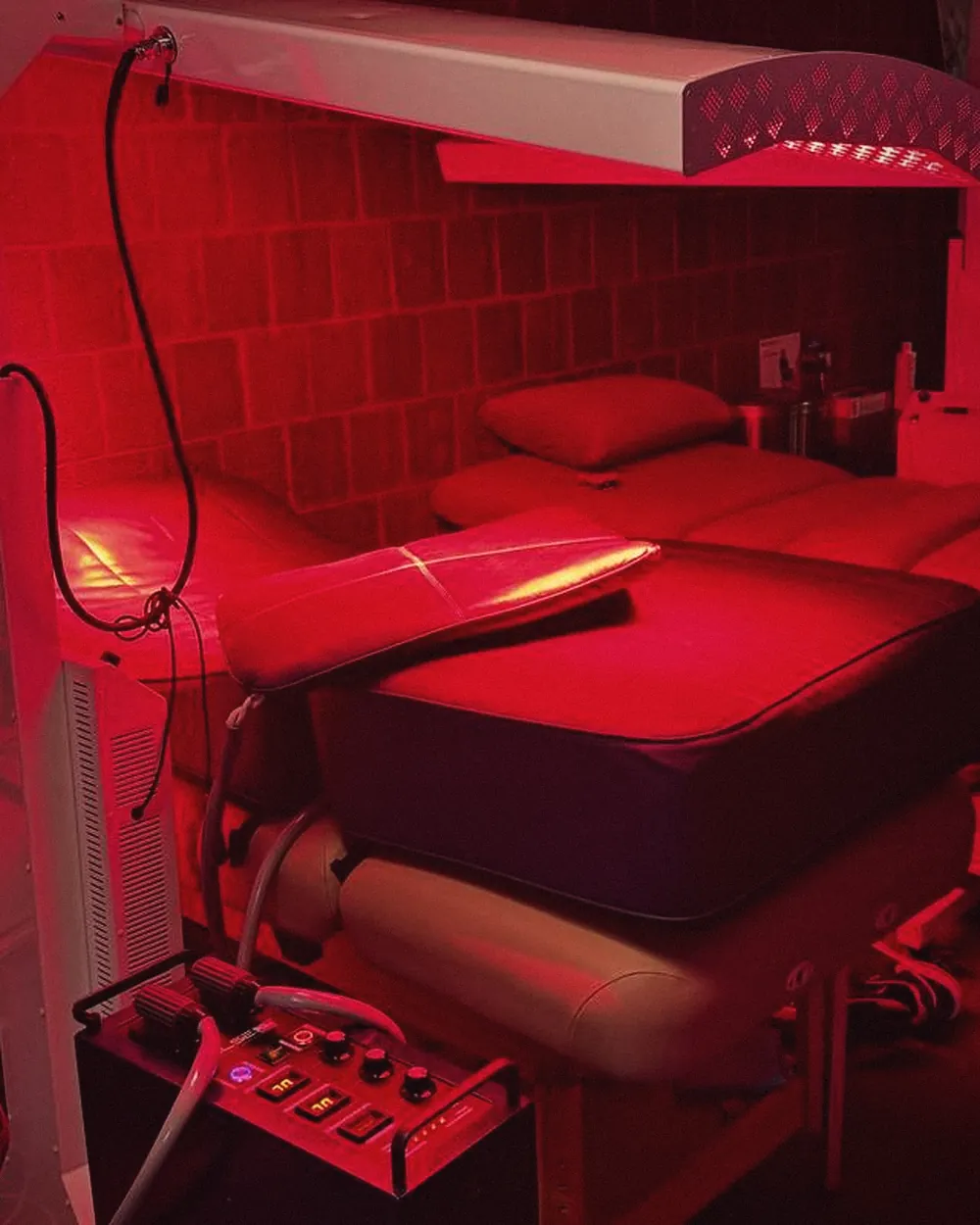 The Rescu red light room glowing during a session