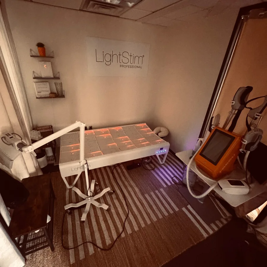 LightStim LED bed and overhead canopy in a treatment room